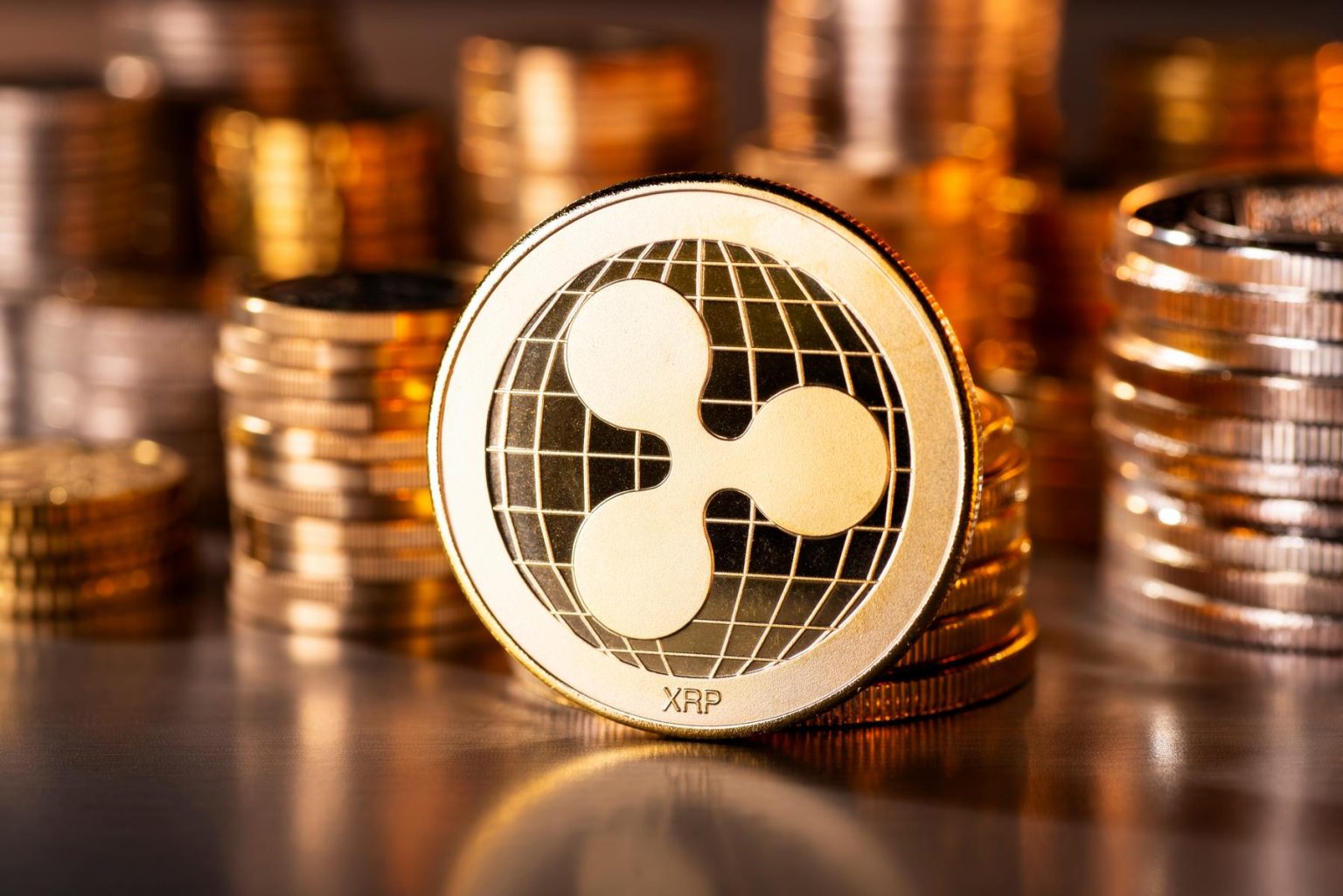 Ripple-XRP-gold-coins-with-a-pool-of-more-coins