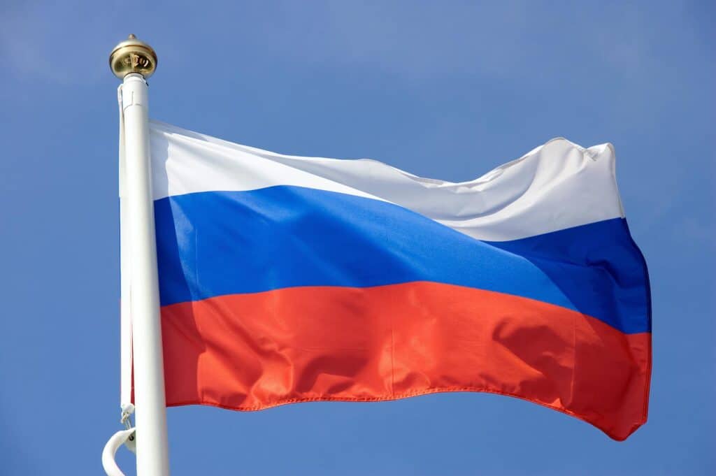 Russian-flag-waving-under-blue-sky